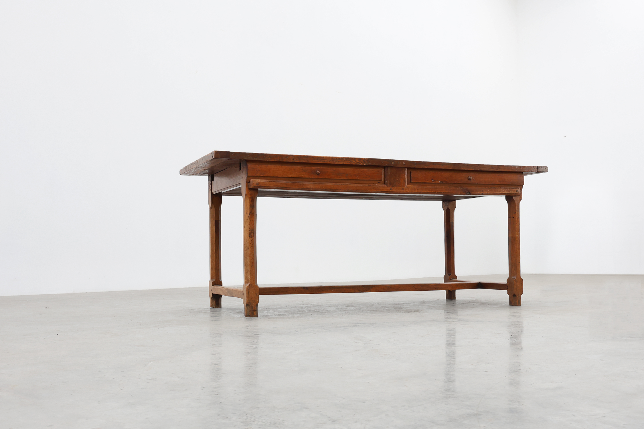 Rustic 19th century oak dinner table with drawers that open laterally, France ca. 1930thumbnail